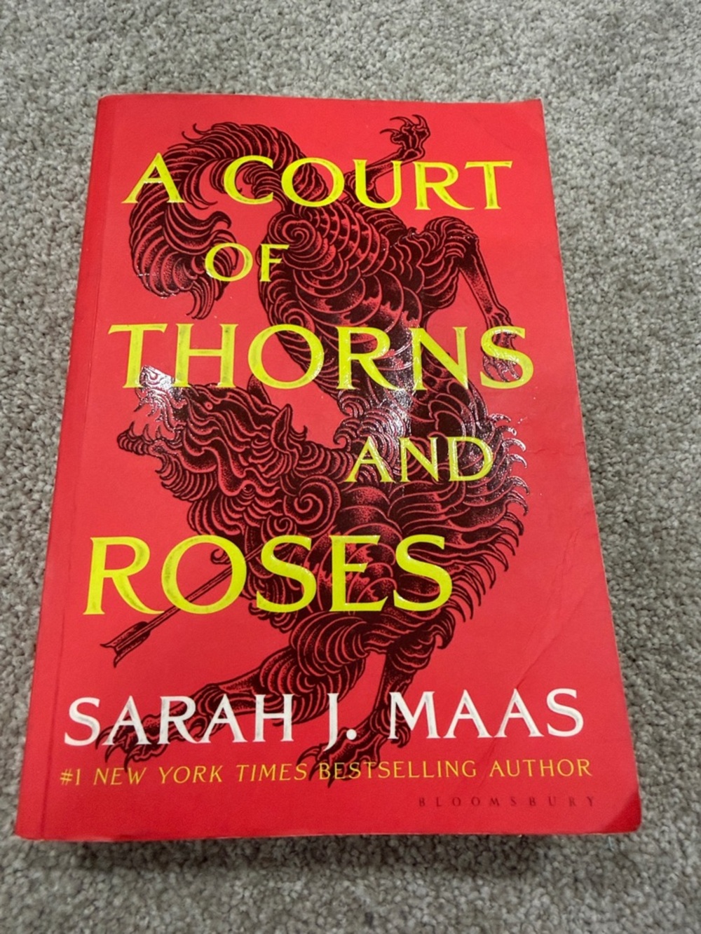 A Court of Thorns and Roses by Sarah J. Maas - Red Hardcover/Trade Paperback